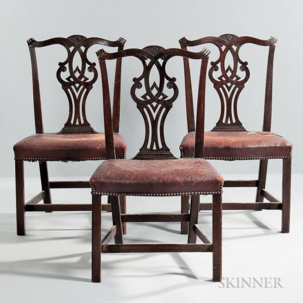 Set of Three Leather-upholstered Carved Mahogany Side Chairs